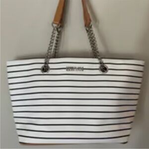 Kenneth Cole reaction, black and white stripes with brown chain handles